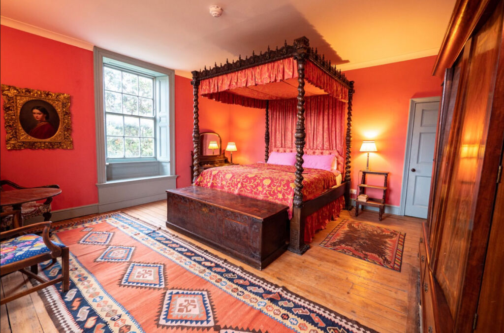 Inside one of the beautifully decorated, traditional style suites in the manor