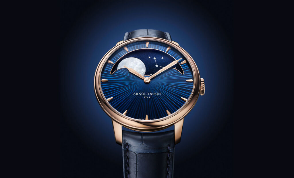 The watch model with the dark blue dial