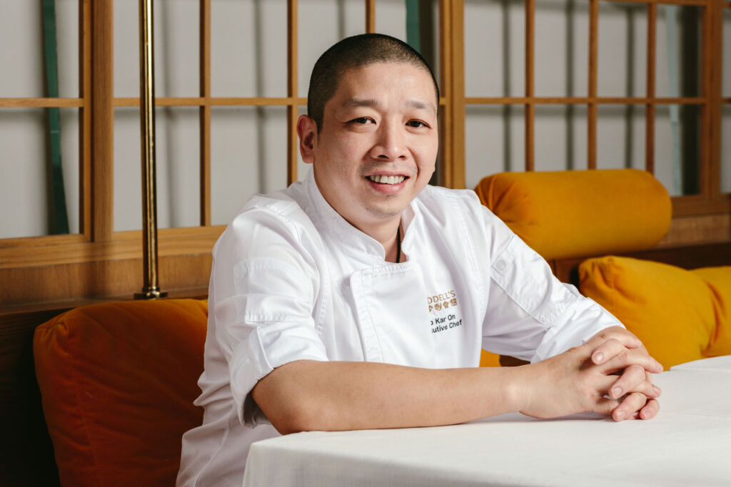 Executive Chef Yip Kar sitting inside the restaurant