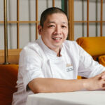 Executive Chef Yip Kar sitting inside the restaurant