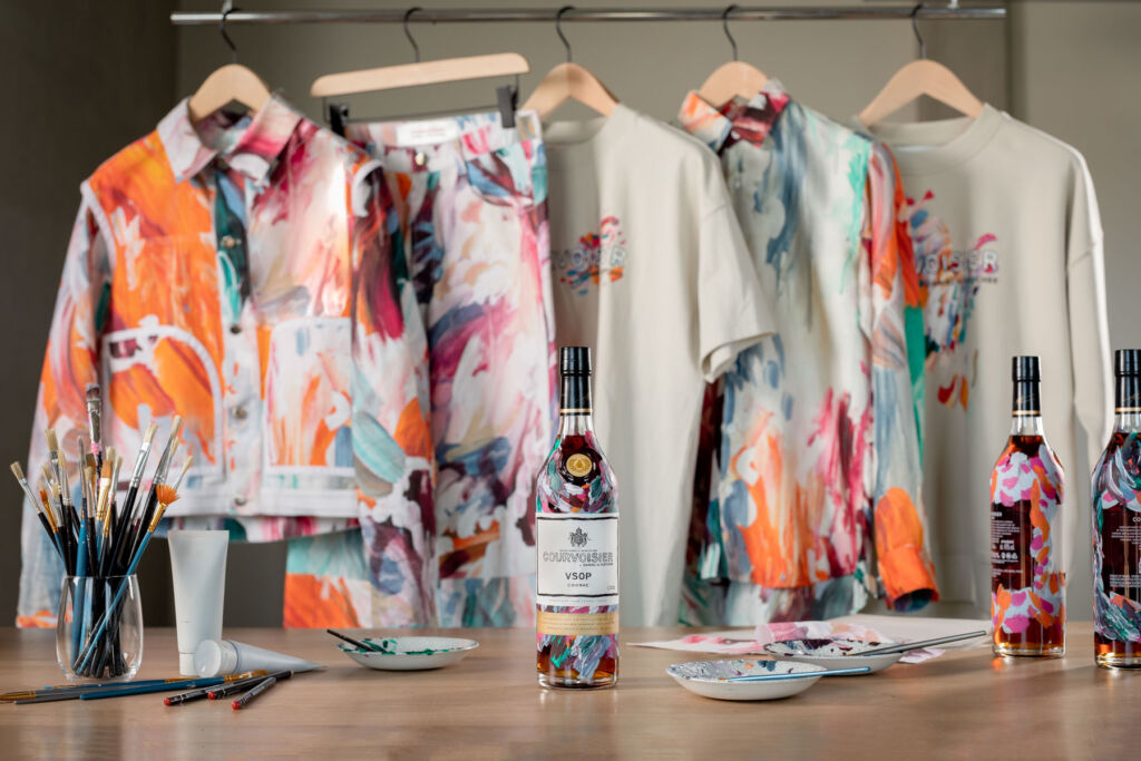 One of the limited edition VSOP bottles with some of Daniel's hand-painted clothes