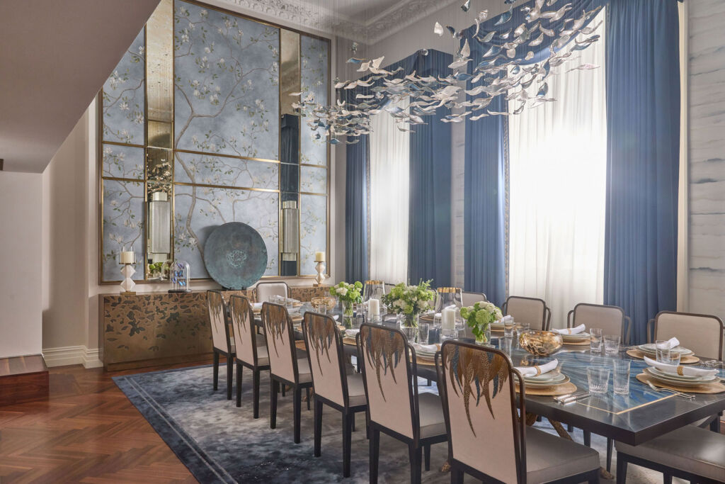 Inside the double height dining room with its large table for dinner guests