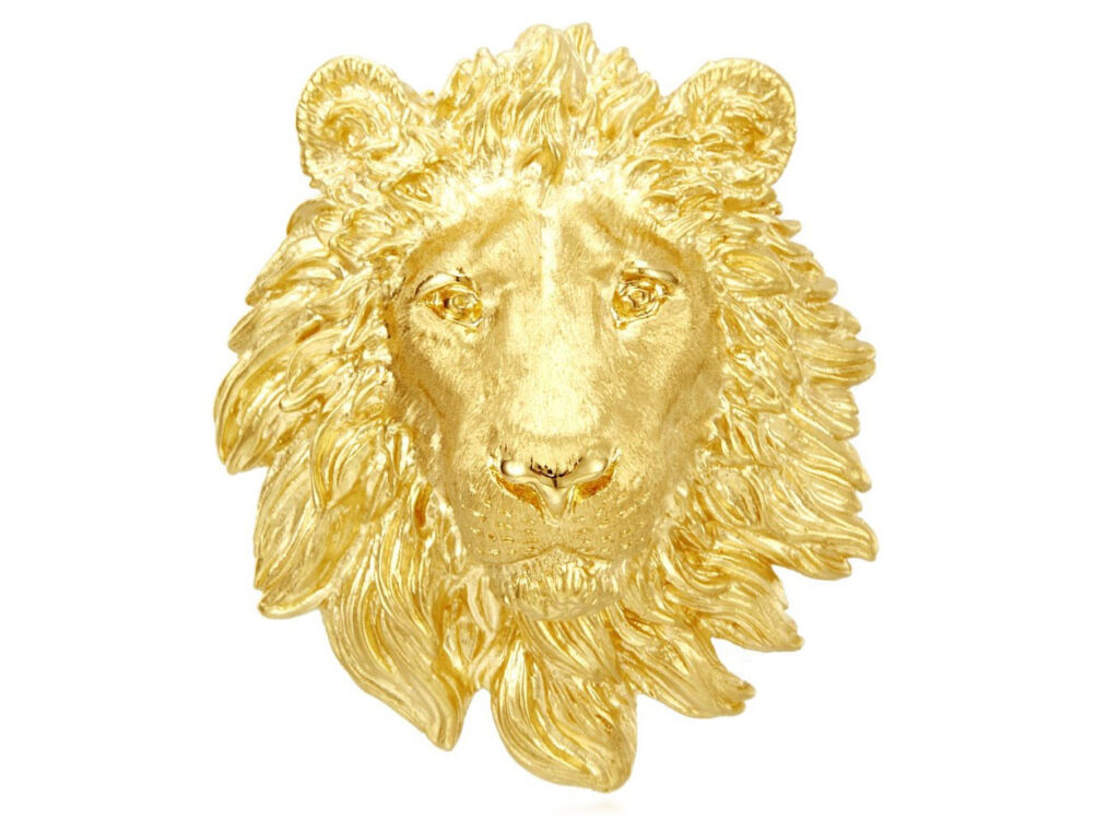 The gold face of the Lion Brooch