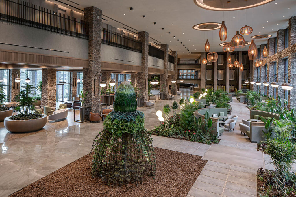The incredible lobby which is filled with greenery, giving the feeling that you're still outdoors