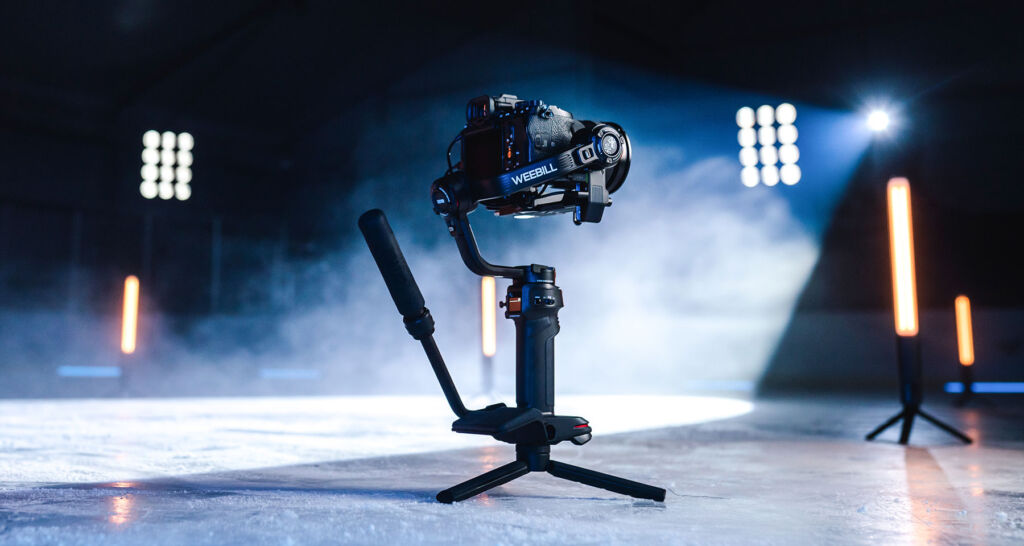 The gimbal on it's tripod being used on low light conditions