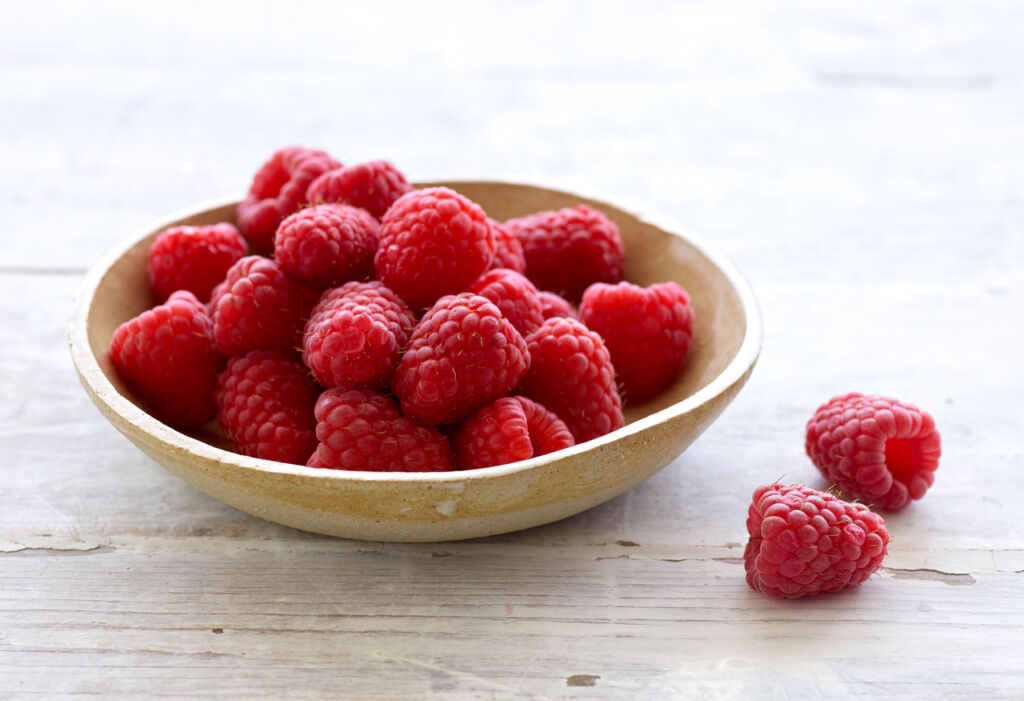 A bowl of fresh raspberries