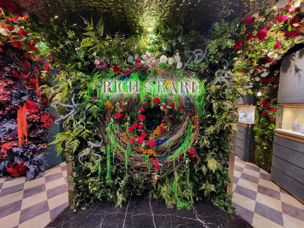 The intricate floral rabbit hole inspired by Alice in Wonderland greeting visitors at the entrance