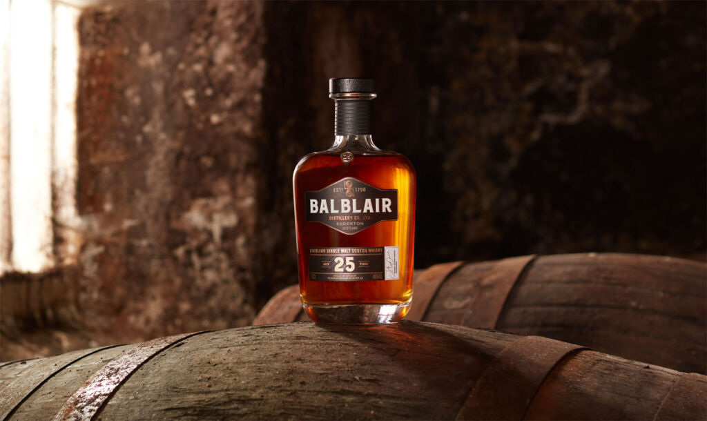 A bottle of the 25-year-old whisky stood on a barrel in the cellar