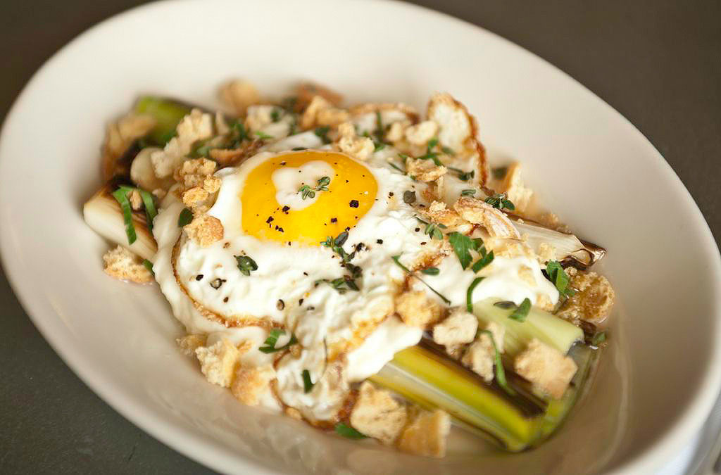 Chef Charleen Badman's award-winning Braised Leeks with mozzarella and a fried egg at downtown Scottsdale's FnB