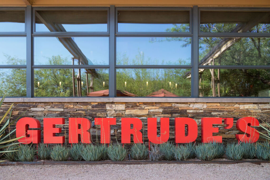 The large red Gertrude's sign outside the restaurant