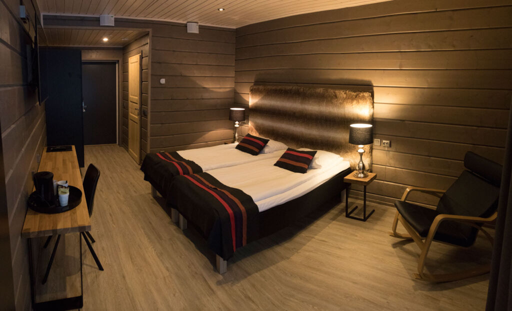 The bedroom inside the log hotel