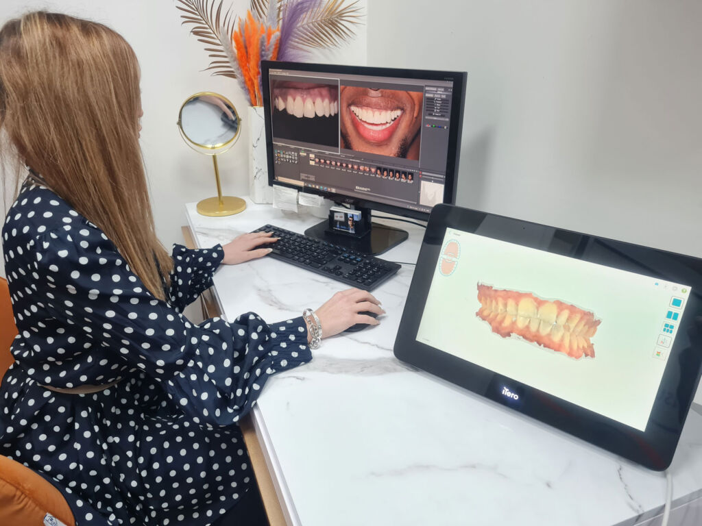 Photographs of a patients teeth being examined on a computer