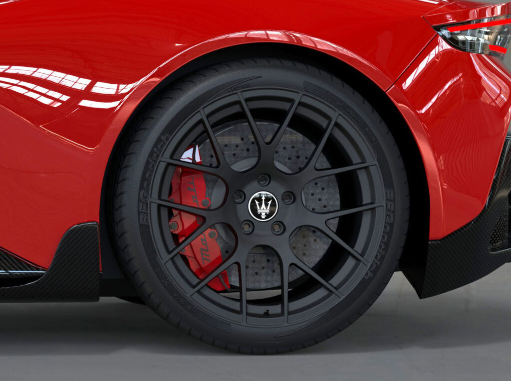 A closeup view of the black coloured alloys on the car