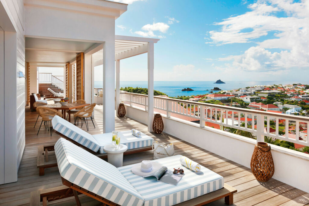 One of the large balcony's with sun loungers and incredible views