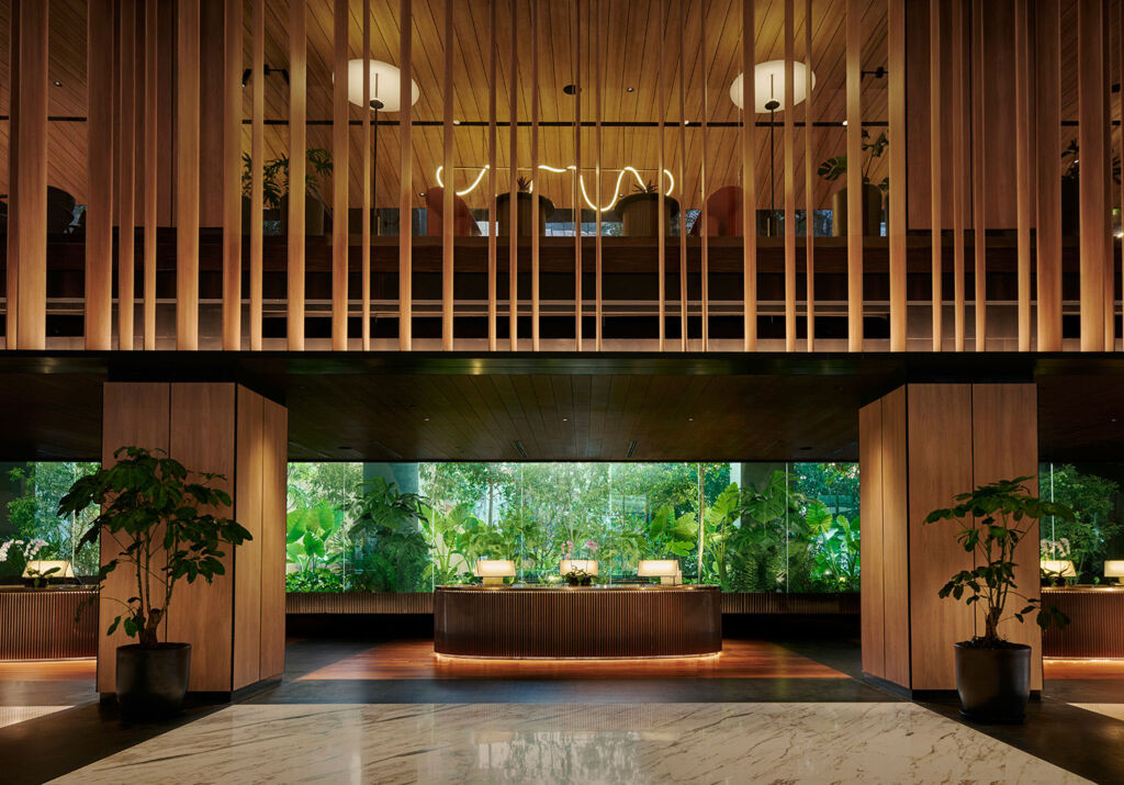 The hotel lobby with its liberal use of wood and plants