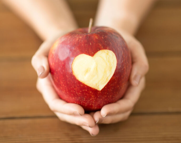 A heart cut into an apple