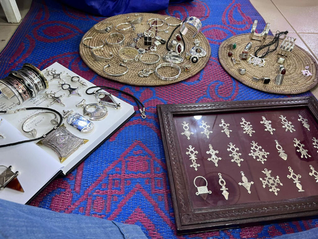 Some of the locally made jewellery, laid out inside a tent