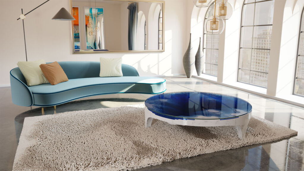 The table placed on a thick pile rug next to a curved shaped sofa