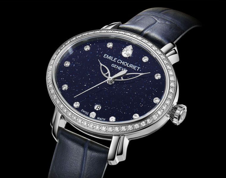 One of the models with a diamond bezel and markers and a dark blue dial that looks like a nigh sky filled with stars
