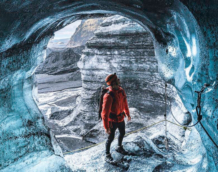 A man inspecting the Katla Ice Cave
