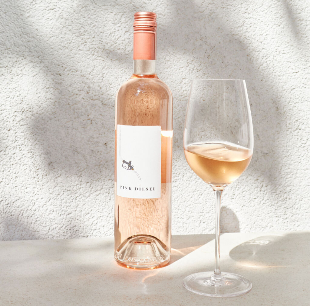 A bottle of the Rosé next to a freshly poured glass