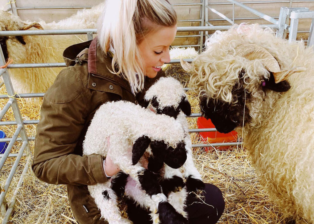 Tanya introducing lambs to the flock