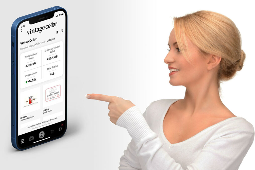 A woman pointing at a phone with the app on its screen