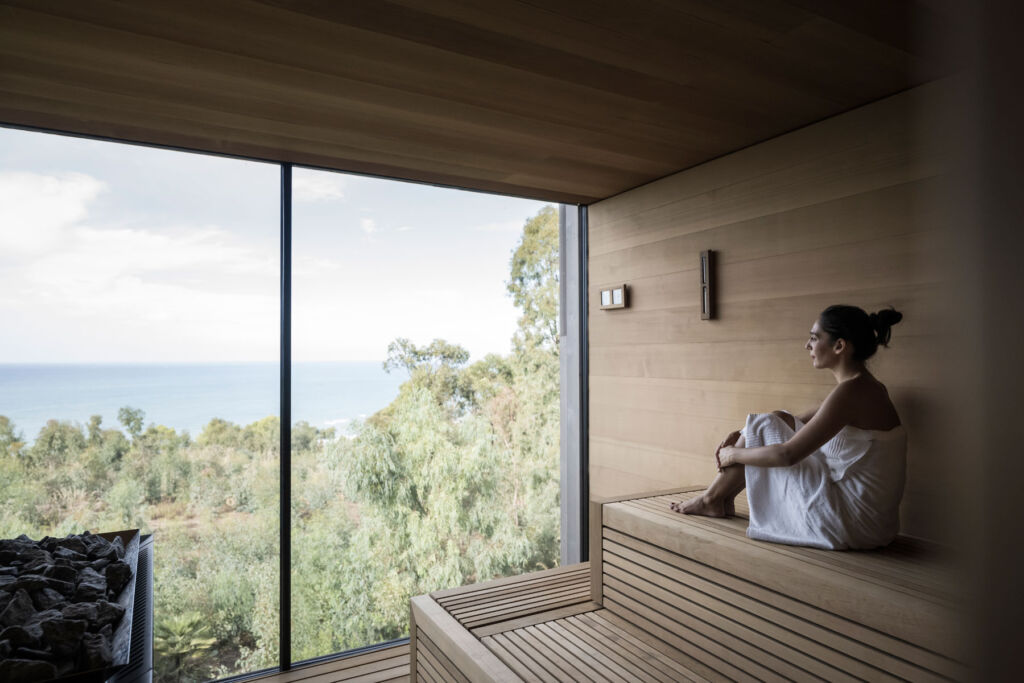 A woman enjoying the view from the sauna
