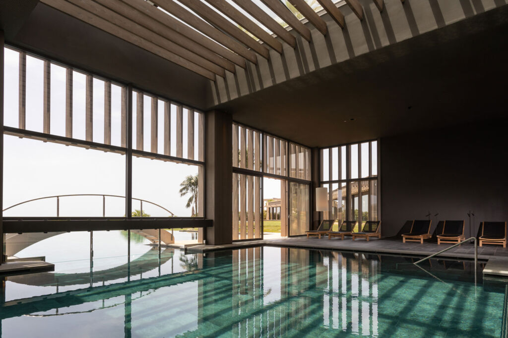 The indoor swimming pool that continues outdoors