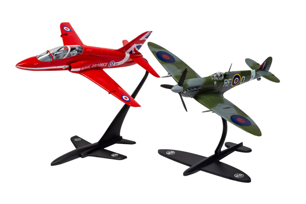 A finished Red Arrows Hawker Jet next to a Spitfire