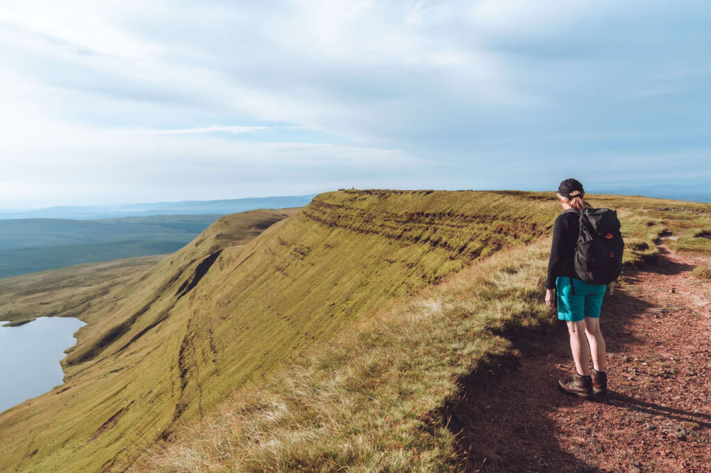 A woman walking across the top of the Black Mountains