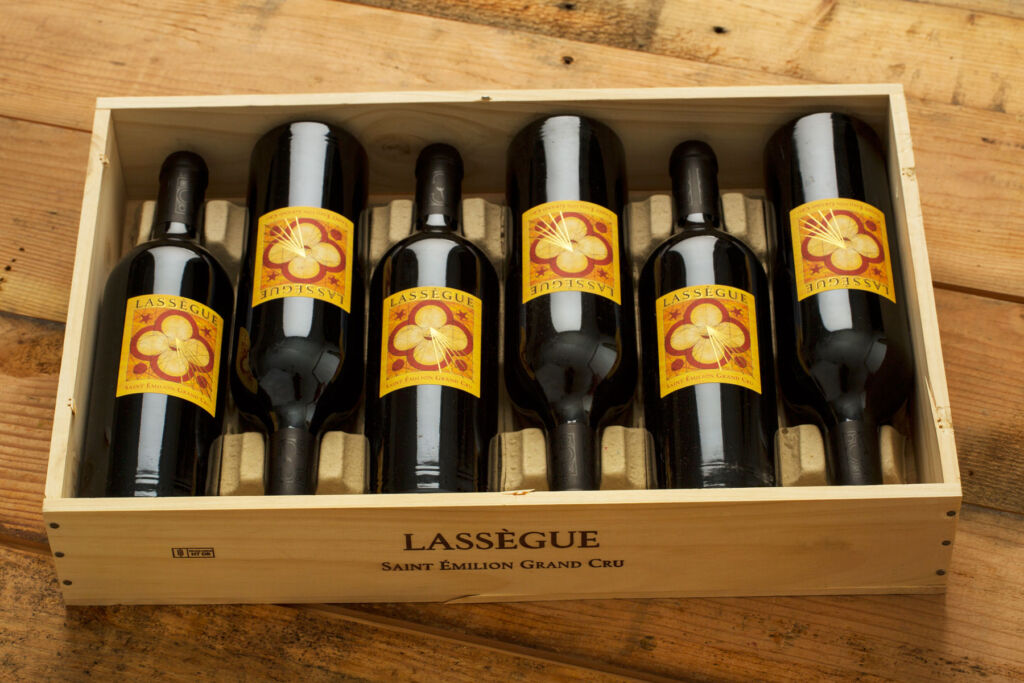 Six Lassègue Saint-Émilion, Grand Cru 2015 bottles in a crate