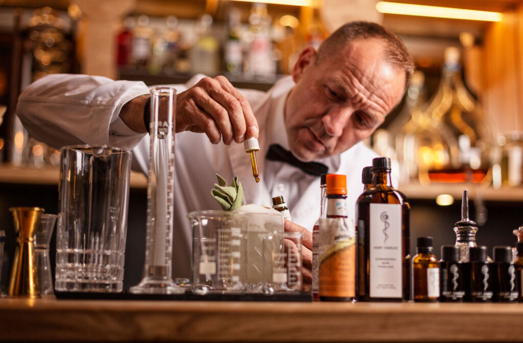 The Botanist creating cocktails at the bar