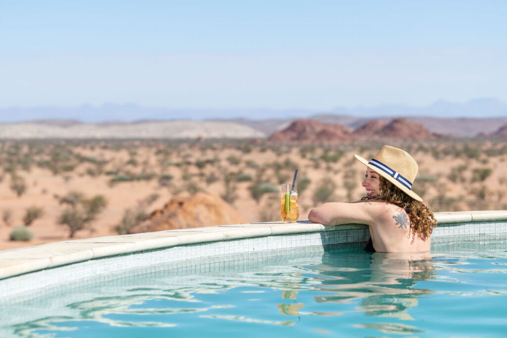 A woman enjoying the views from the swimming pool