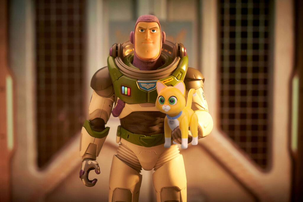 Buzz Lightyear holding Sox the cat in his arm