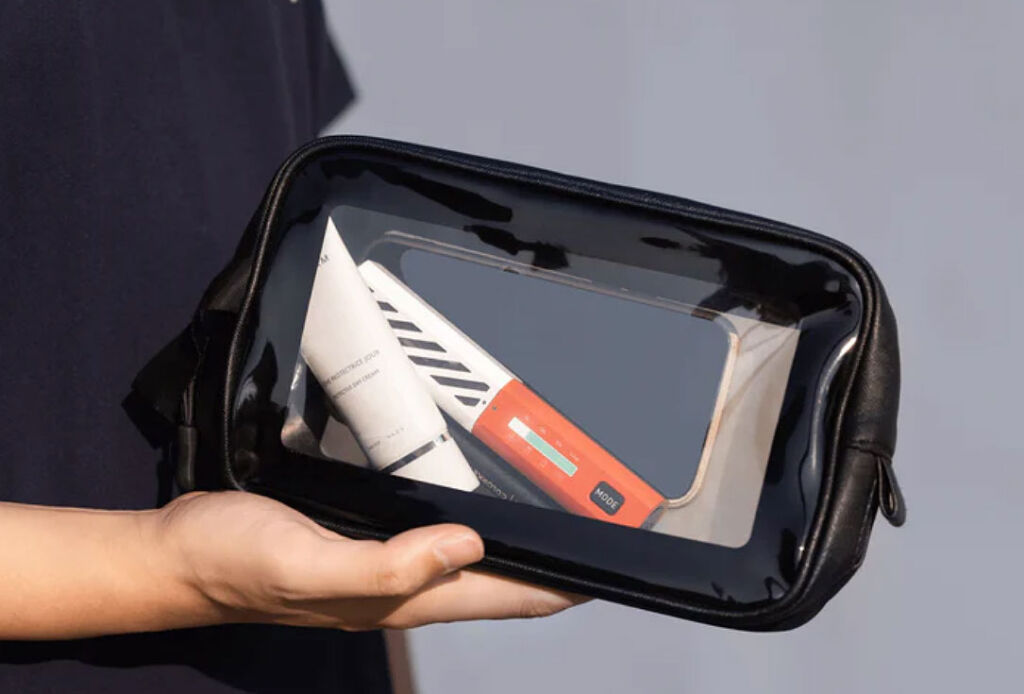 The device on a small handbag with a see-thru front