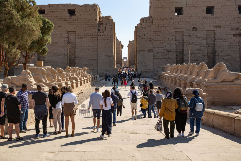 People exploring one of the complexes at Luxor