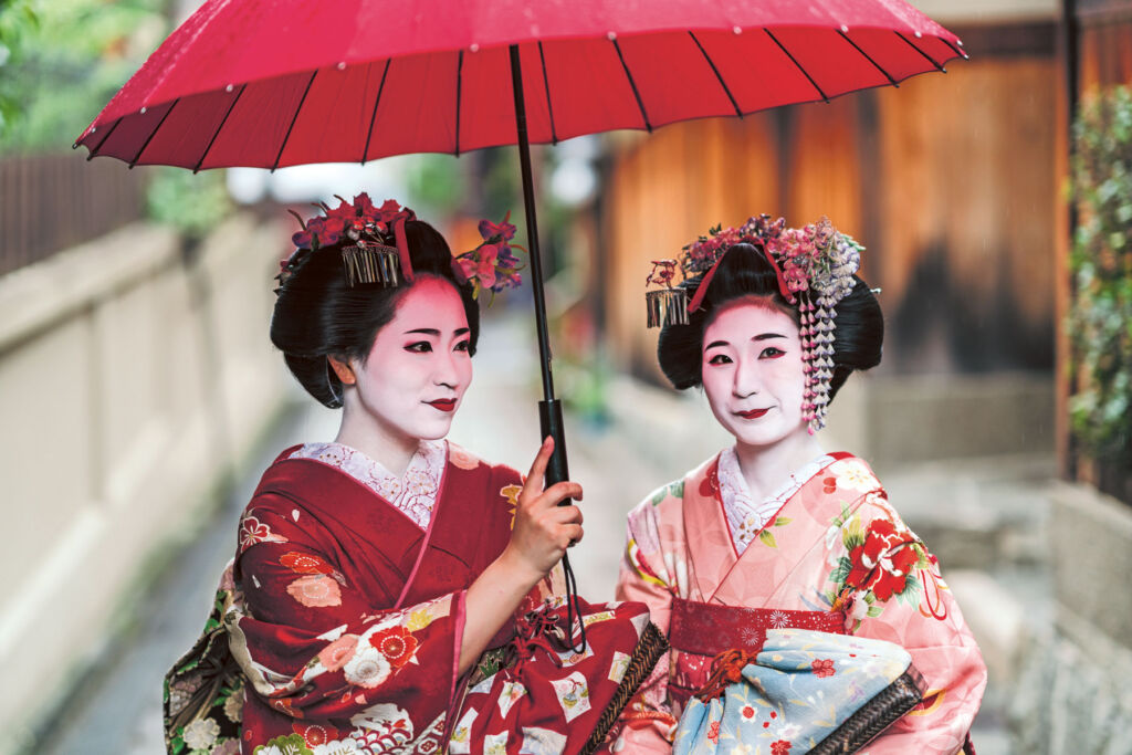Two ladies in traditional Japanese Geisha clothing