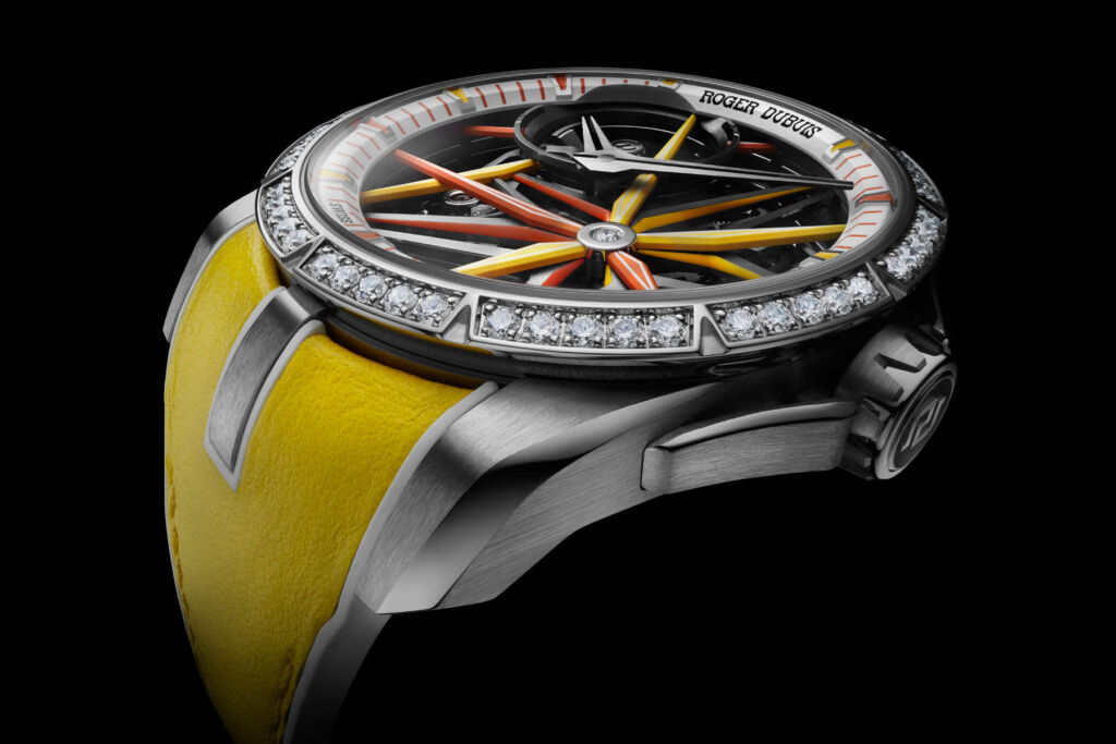 An image showing the white gold, jewelled case with a bright yellow strap