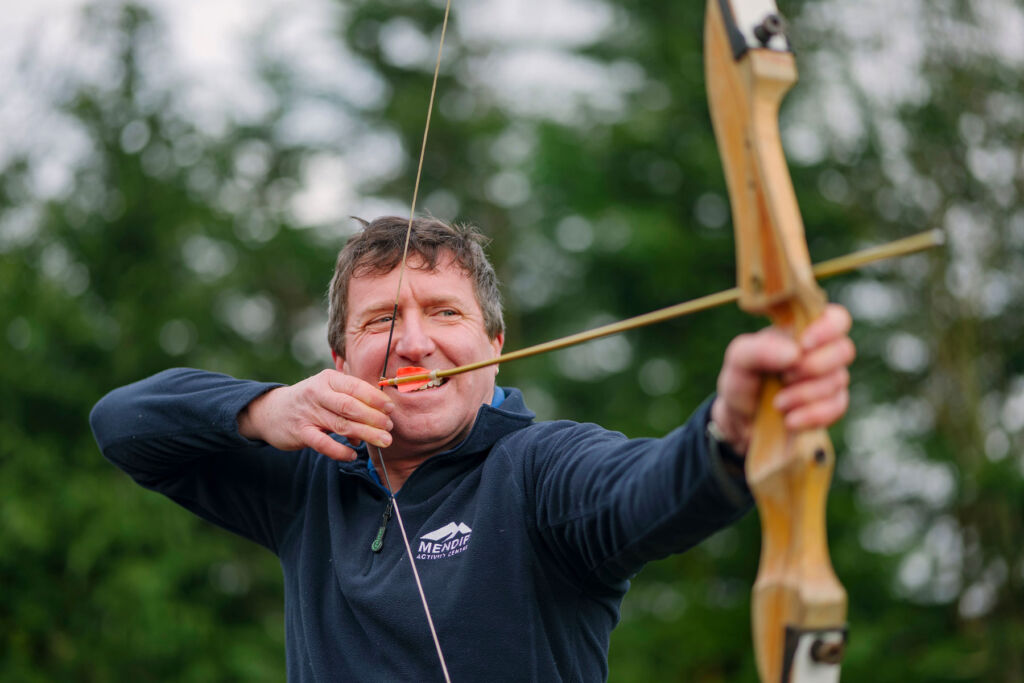 Martin testing out his archery skills