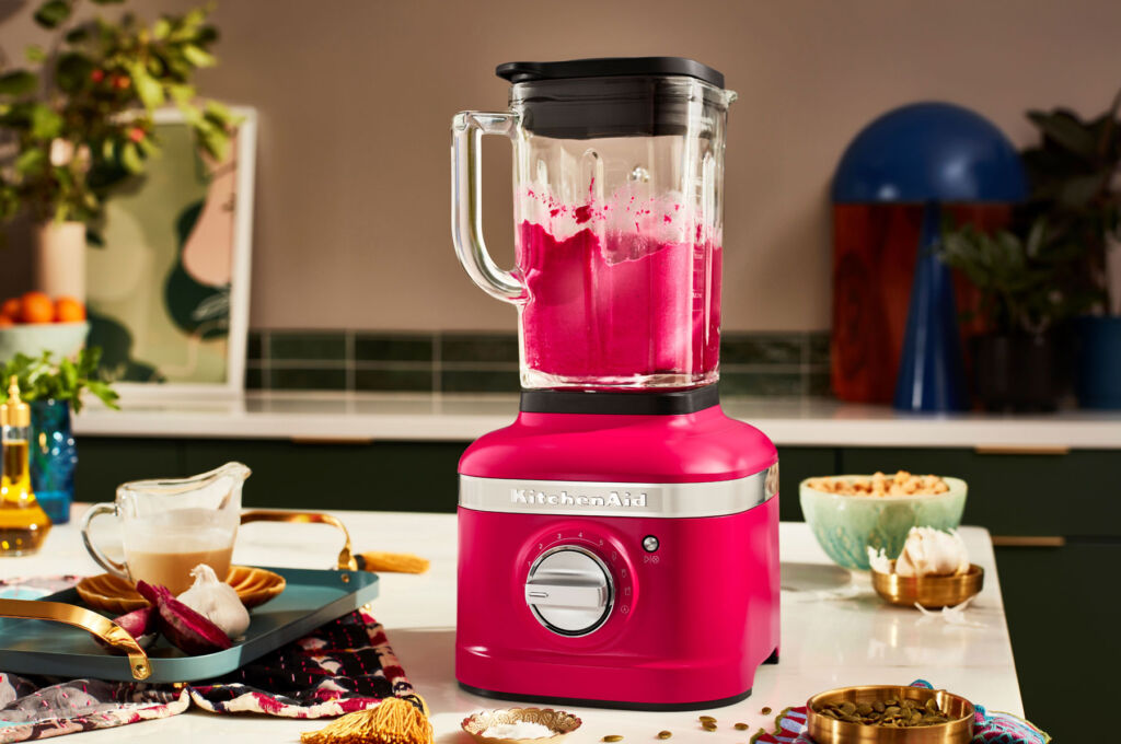 The K400 Blender on a kitchen worksurface surrounded by ingredients ready for blending