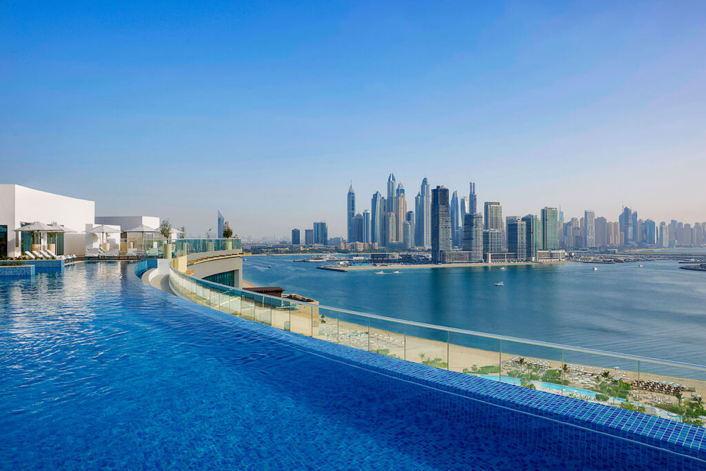 The hotel's rooftop crescent shaped infinity pool