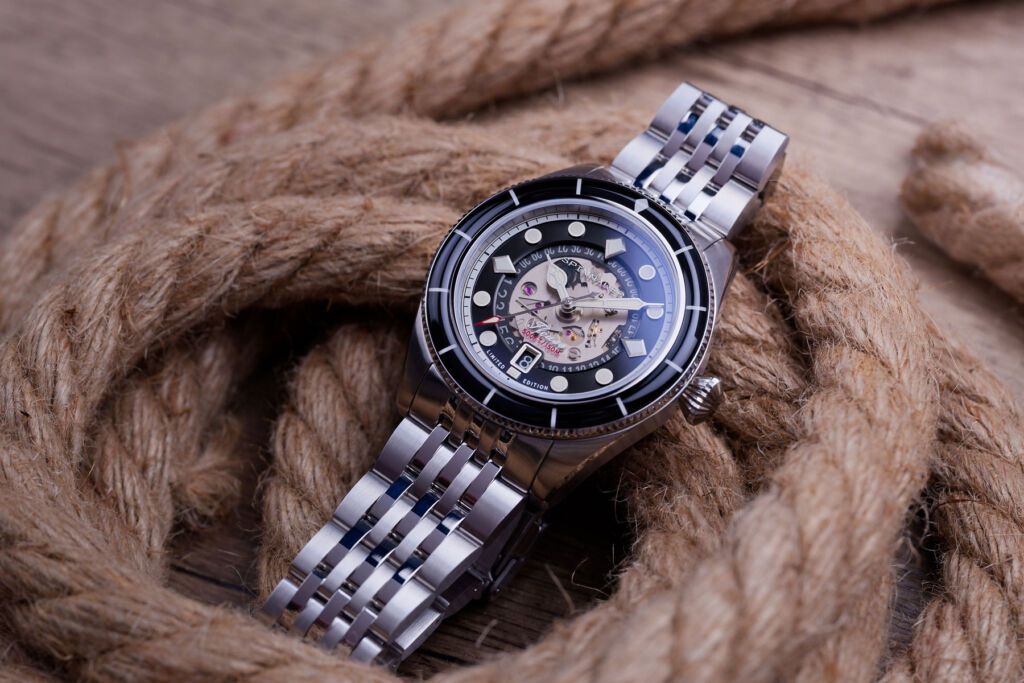 The steel bracelet version of the diver's watch on a coil of rope