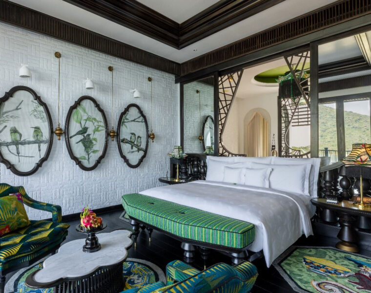 A bedroom inside the villa with its historical Asian-inspired decor