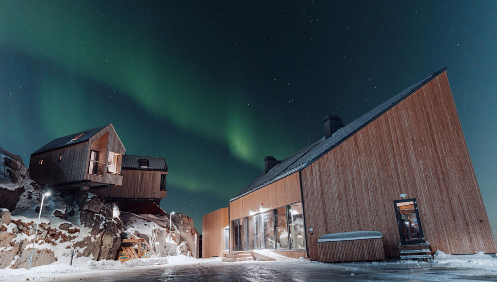 The restaurant with the Northern Lights illuminating it