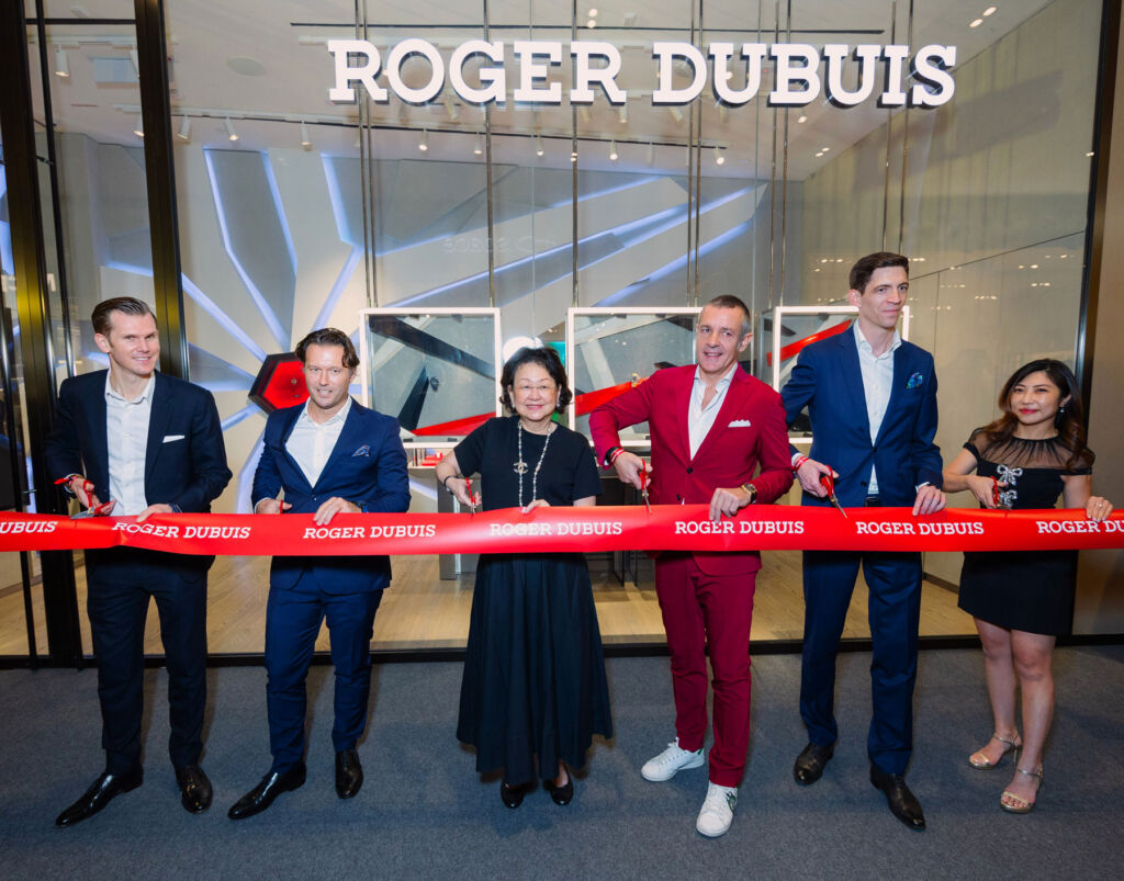 Cutting the ribbon at the opening of the new flagship store in Kuala Lumpur