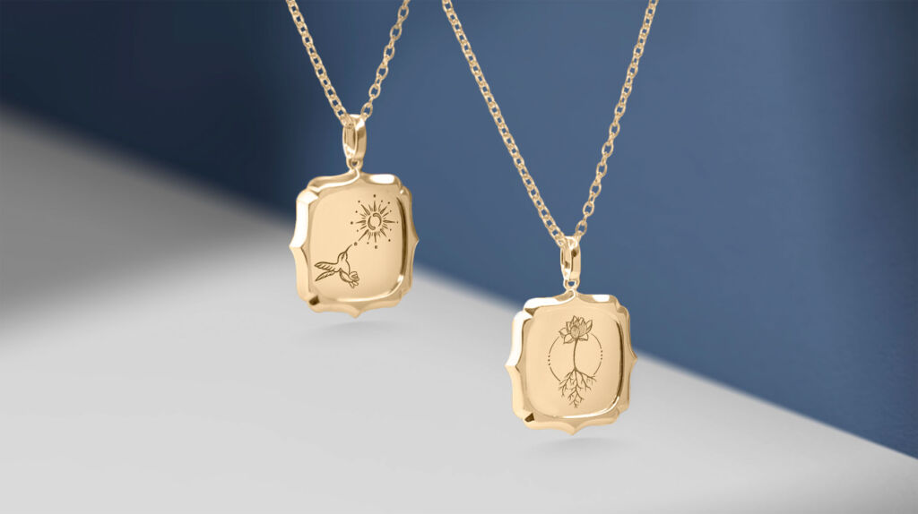Two engraved Affirmation necklaces in gold