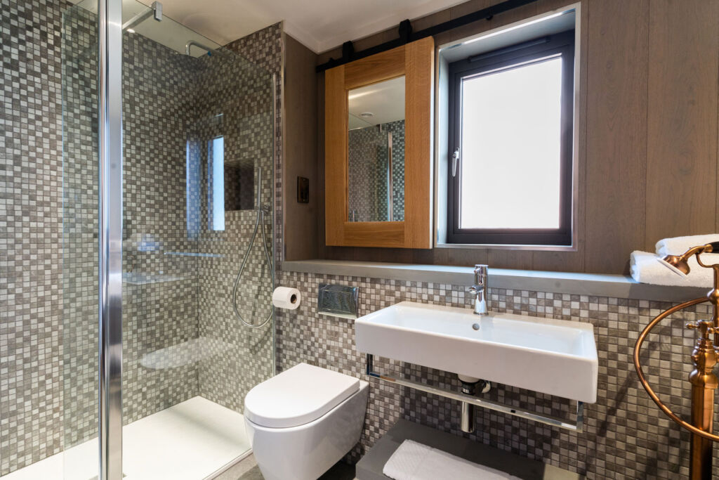 The well-kitted bathroom with its walk in shower
