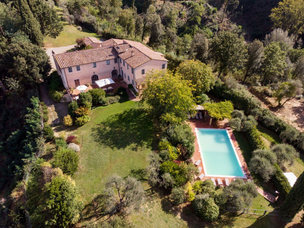 An aerial view of Villa Fagnana showing its grounds and swimming pool
