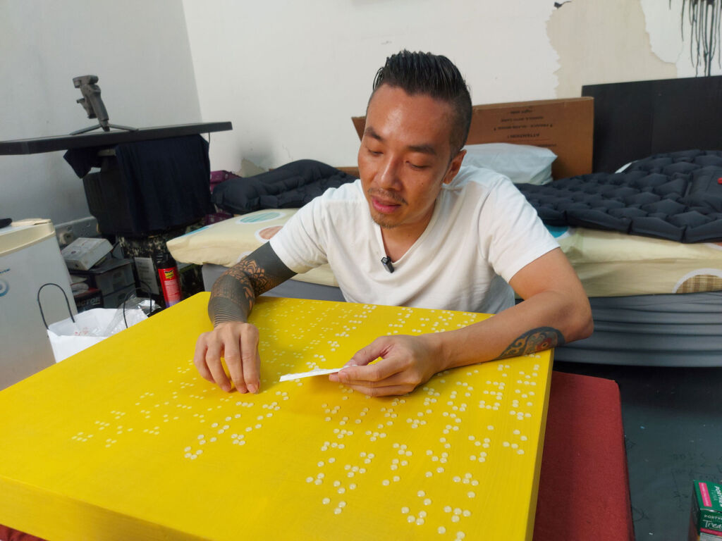 Ivan working on a Braille piece in his studio